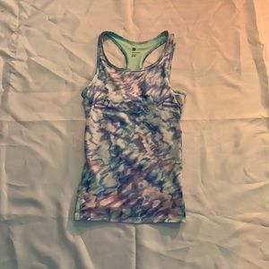 This beautiful blue, mint green, and purple tank top is super comfortable